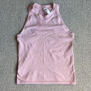 Athleta racerback tank. Pink color. In excellent condition! Size medium.